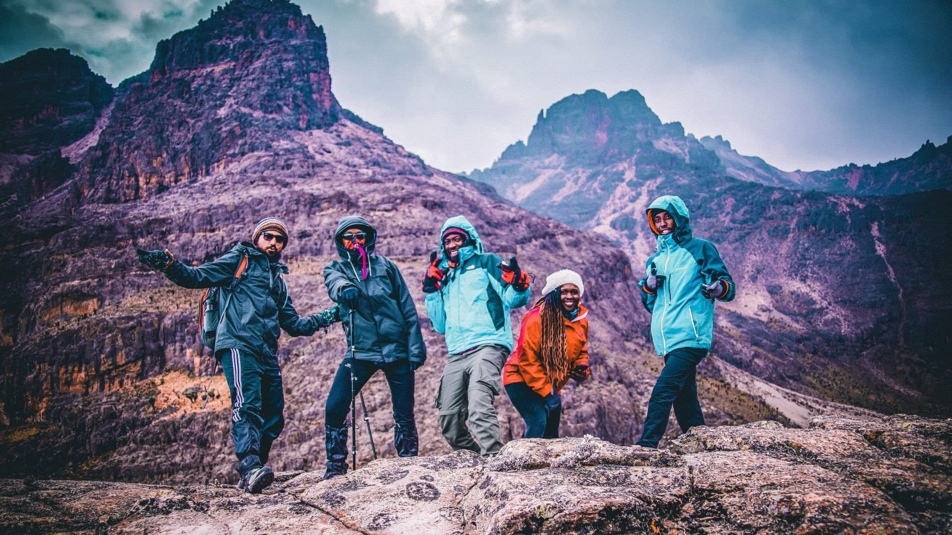 A group of climbers on the rocky upper slopes of Mount Kenya